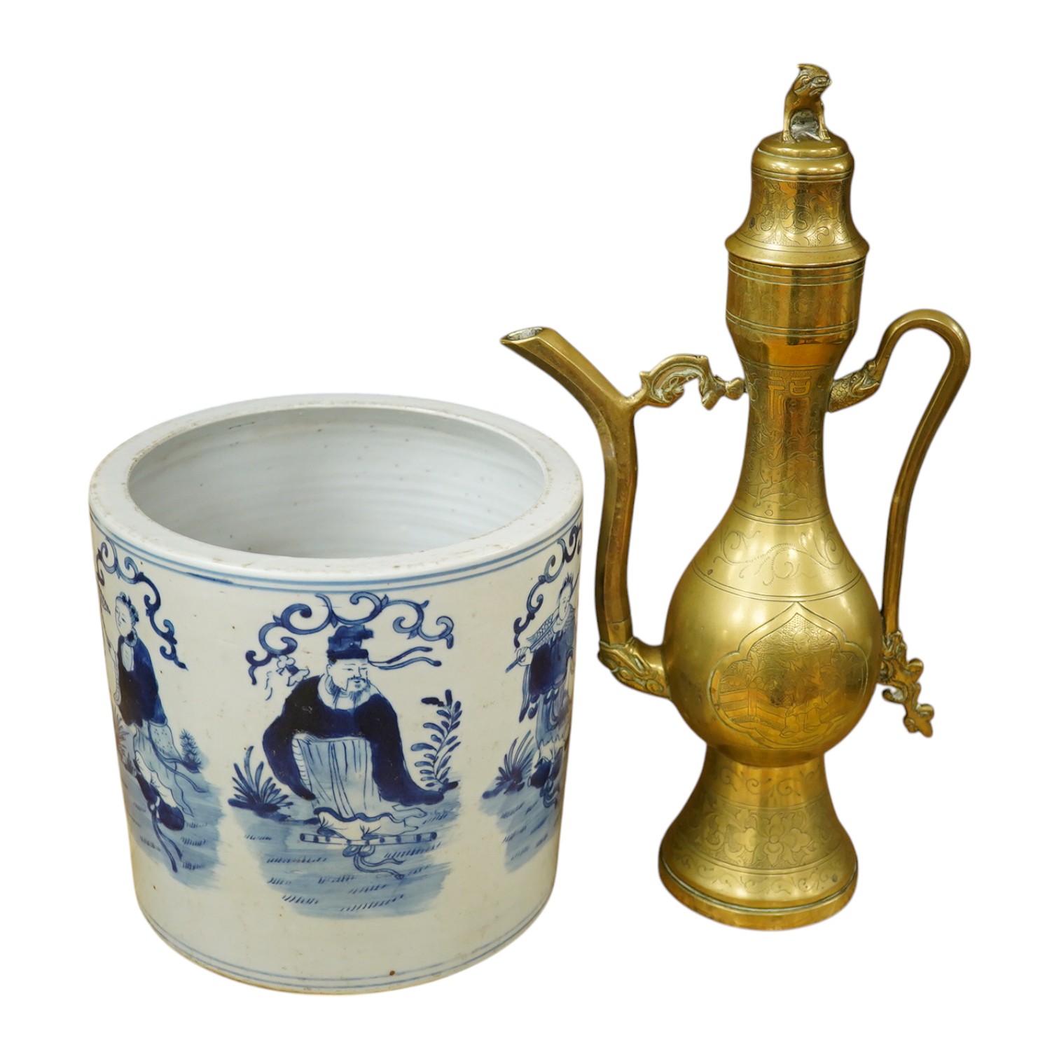 A Chinese cylindrical blue and white brush pot and a brass ewer, largest 39cm high. Condition - fair